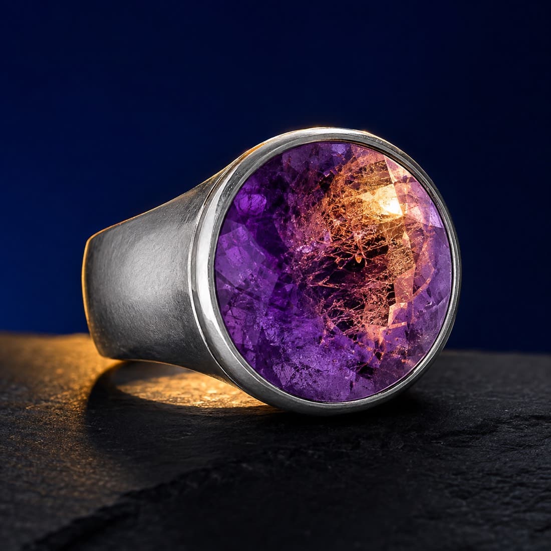 Amethyst Cocktail Ring 10 mm — A 10 mm round amethyst on a broad silver shank. Hallmarked at London.