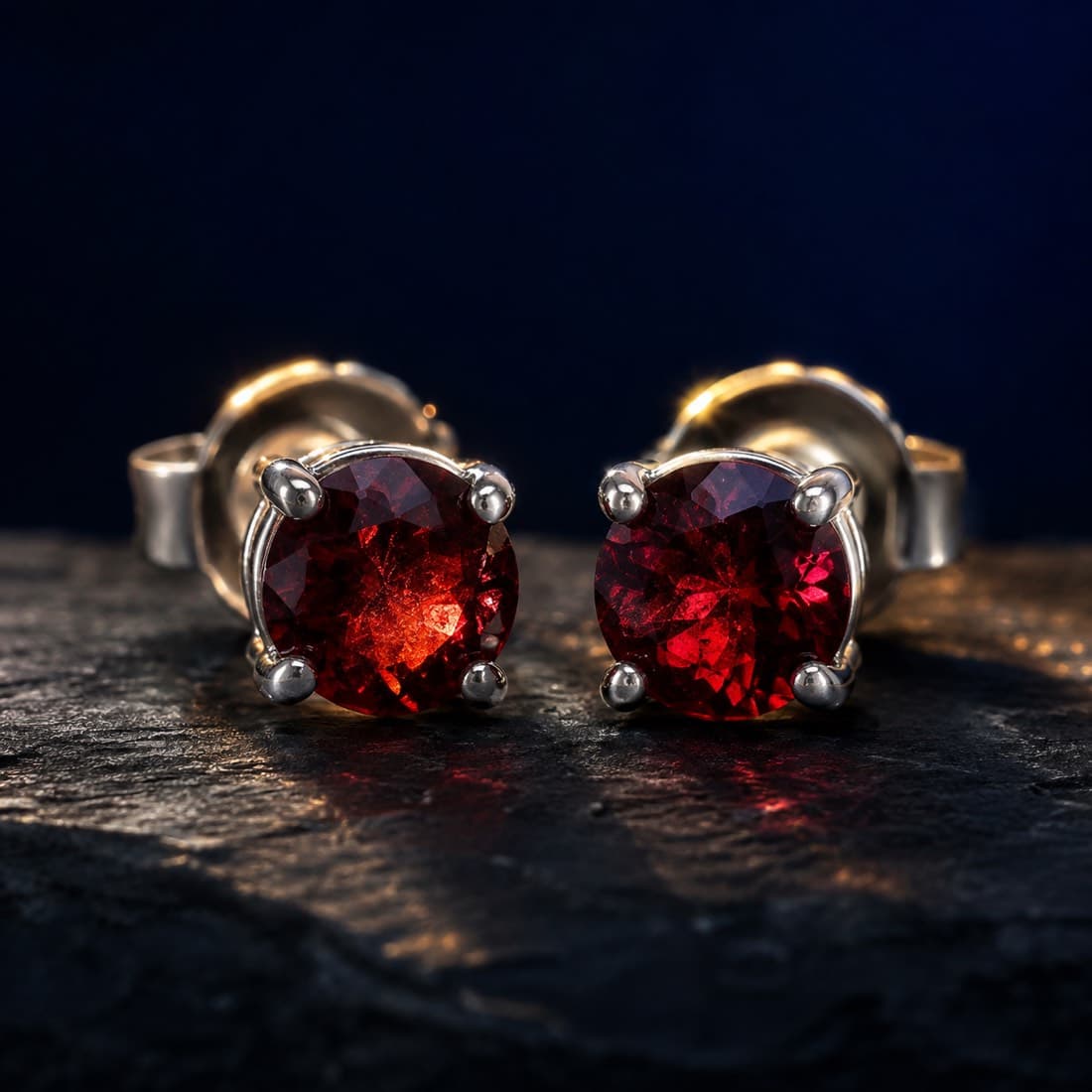 Garnet Stud Pair 4 mm — Matched pair of 4 mm garnets, silver posts and butterfly backs.