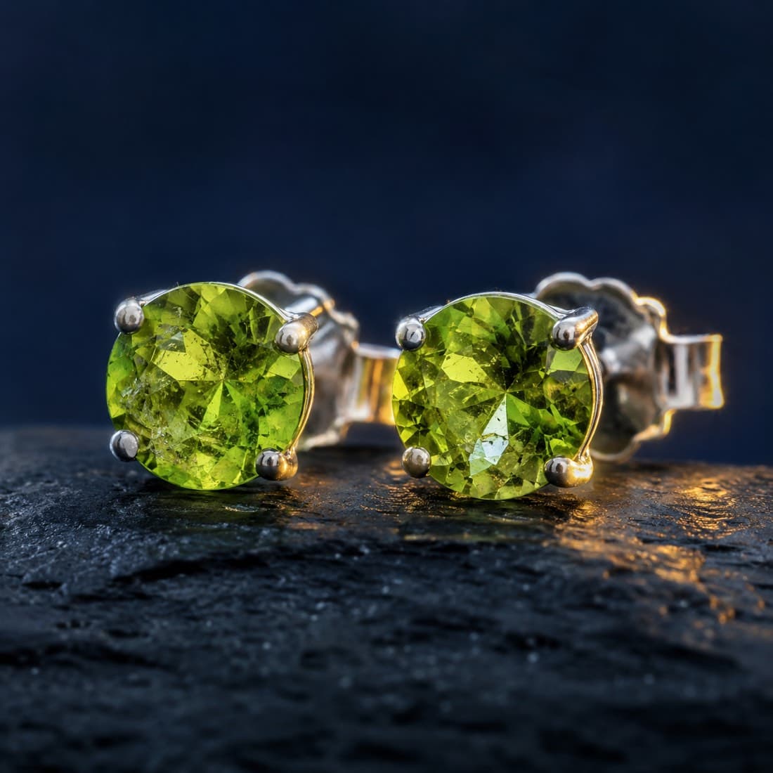 Peridot Stud Pair 5 mm — Matched untreated peridots on silver posts.